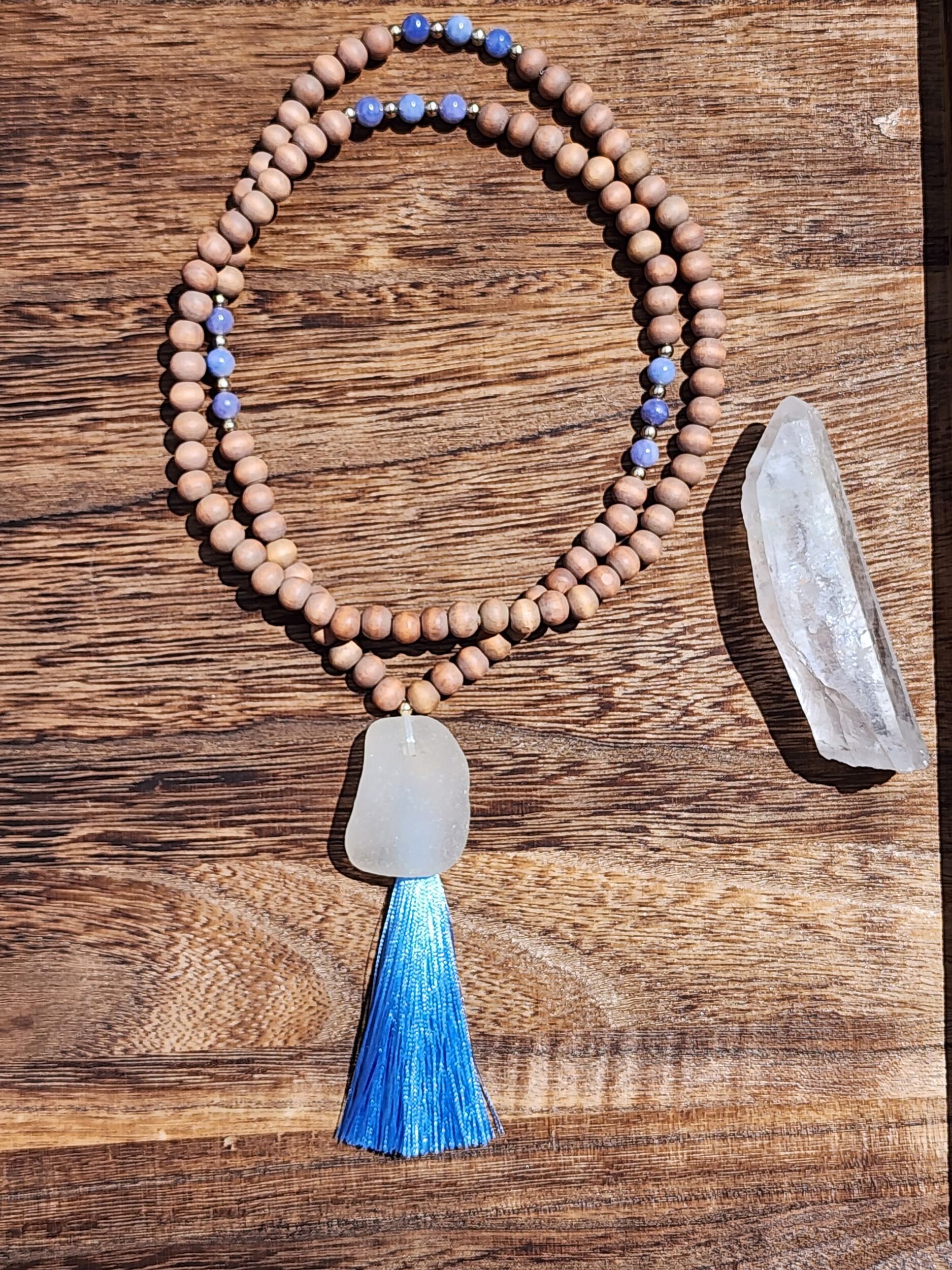 Blue Lace Agate Mala featuring weathered wood, local clear sea glass, and blue tassel