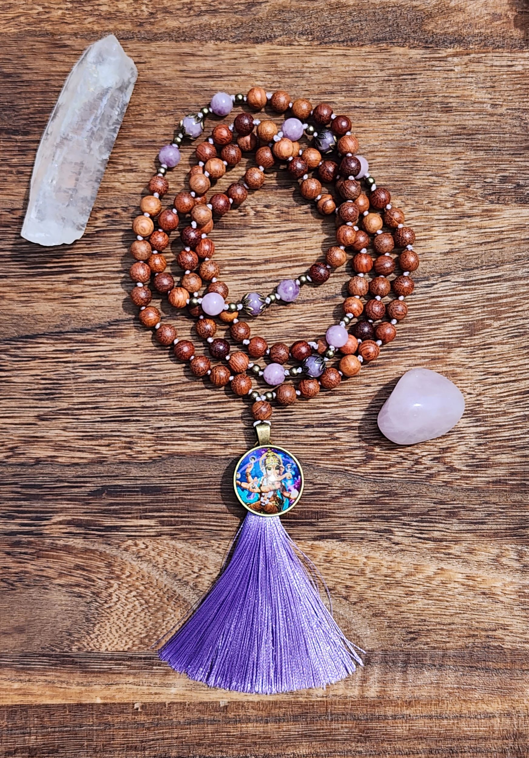 Hand Knotted Lepidolite Mala featuring olive wood, Ganesha cabochon and purple tassel